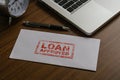 Loan approved word by rubber stamping on envelope.Loan business finance economy commercial real estate investments concept