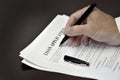 Loan Contract Document on Desk with Black Pen Royalty Free Stock Photo