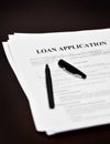 Loan Contract Document on Desk with Black Pen Royalty Free Stock Photo