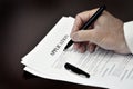 Loan Contract Document on Desk with Black Pen Royalty Free Stock Photo