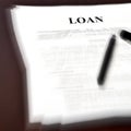 Loan Document Agreement on Desk with Pen Royalty Free Stock Photo