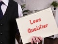 Loan Qualifier inscription on the sheet Royalty Free Stock Photo