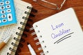 Loan Qualifier sign on the sheet Royalty Free Stock Photo
