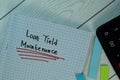 Loan Yield Maintenance write on a book isolated on Wooden Table