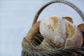 loaves of bread from the bakery in the store. Basket wicker with pastries. Royalty Free Stock Photo