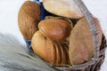 loaves of bread from the bakery in the store. Basket wicker with pastries. Royalty Free Stock Photo