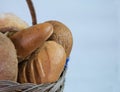 loaves of bread from the bakery in the store. Basket wicker with pastries. Royalty Free Stock Photo