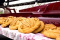 Loaves of bread on the harvester reaper Royalty Free Stock Photo