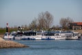 Lobith Netherlands April 2020, passenger boats moored with no work during the Corona , Covid 19 crisis in the