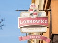 Lobkowicz Pivo logo in front of a local retailer bar in Prague. Royalty Free Stock Photo