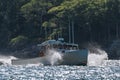 Lobster boat comes home from a rough day at sea in early autumn in South Bristol, Maine, United States Royalty Free Stock Photo