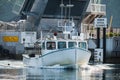 Lobster boat heads out for a beautiful days work in South Bristol, Maine, United States Royalty Free Stock Photo