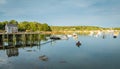 Lobster boats are moored in the harbor at dusk i