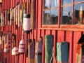 Lobster buoys on shack Royalty Free Stock Photo