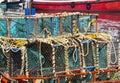 Lobster cages on boat in harbour