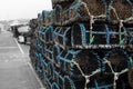 Lobster crab pots stacked on a quayside Royalty Free Stock Photo