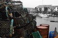 Lobster crab pots stacked on a quayside Royalty Free Stock Photo