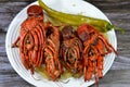 Lobster meal cooked and served, Lobsters are a family Nephropidae, Homaridae of marine crustaceans, with long bodies and muscular Royalty Free Stock Photo