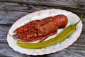 Lobster meal cooked and served, Lobsters are a family Nephropidae, Homaridae of marine crustaceans, with long bodies and muscular Royalty Free Stock Photo