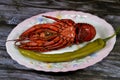 Lobster meal cooked and served, Lobsters are a family Nephropidae, Homaridae of marine crustaceans, with long bodies and muscular