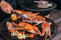 Lobster and mix seafood barbecue cokking on grill