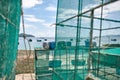 Lobster netting cages on sand beach in Vietnam Royalty Free Stock Photo