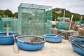 Lobster netting cages on sand beach in Vietnam Royalty Free Stock Photo