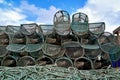 Lobster pots or crab traps stacked up on Tobermory harbor quayside, Isle of Mull, Scotland Royalty Free Stock Photo