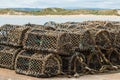 Lobster pots in sandy bay Royalty Free Stock Photo