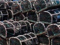 Lobster Pots stacked on quayside. Royalty Free Stock Photo