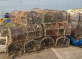 Lobster pots stacked on the quayside Royalty Free Stock Photo