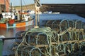 Lobster pots and trawlers at Dunbar harbour Royalty Free Stock Photo