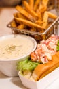 Lobster Roll and Bisque with French Fries Royalty Free Stock Photo