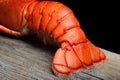 Lobster tail on wood