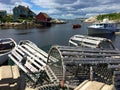 Lobster traps, boats and houses in Peggy's Cove, Canada Royalty Free Stock Photo