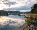 Lobster traps on the dock overlooking bay at dawn Maine summer Royalty Free Stock Photo