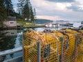 Lobster traps on the dock overlooking bay at dawn Maine summer Royalty Free Stock Photo