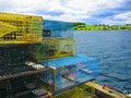 Lobster traps piled at a fishing wharf Royalty Free Stock Photo