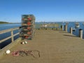 Lobster traps stacked on pier Cape Porpoise Maine