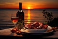 Lobster and wine on the background of the setting sun, Dinner with seafood and red wine on the background of sea sunset, AI Royalty Free Stock Photo