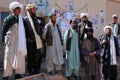 Local Afghan men with turbans in a remote village in Afghanistan near Chaghcharan. Royalty Free Stock Photo