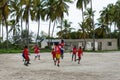 Local african soccer team during training on sand playing field