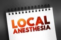 Local Anesthesia - technique to induce the absence of sensation in a specific part of the body, text on notepad, concept