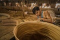 Local artisans crafting Thai-style dragon jars in factory at Ratchaburi, Thailand