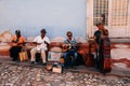A local band plays music in the back streets of Trinidad, Cuba.