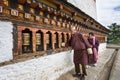 Local Bhutanese turning prayer wheels