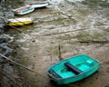 Local boats on the sandy intertidal zone at low tide Royalty Free Stock Photo