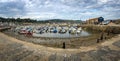 Local boats on the sandy intertidal zone at low tide Royalty Free Stock Photo