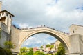 A local Bosnian prepares to dive off the Stari Most, the old bridge in Old Town Mostar, Bosnia and Herzegovina