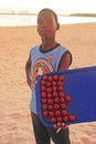 Local boy selling sweets at Boca Chica beach